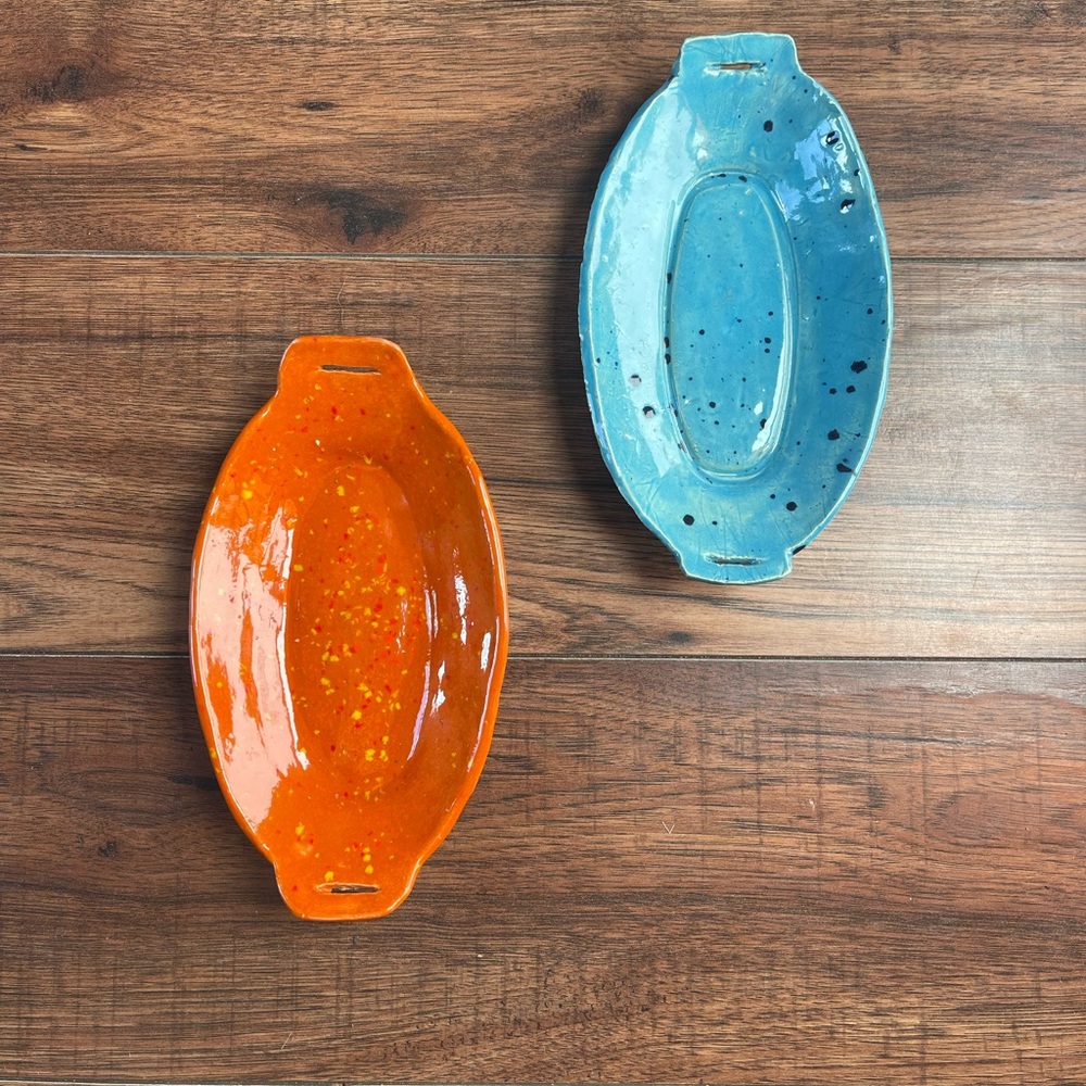 Set of Two Oval Pottery Dishes in Orange and Blue